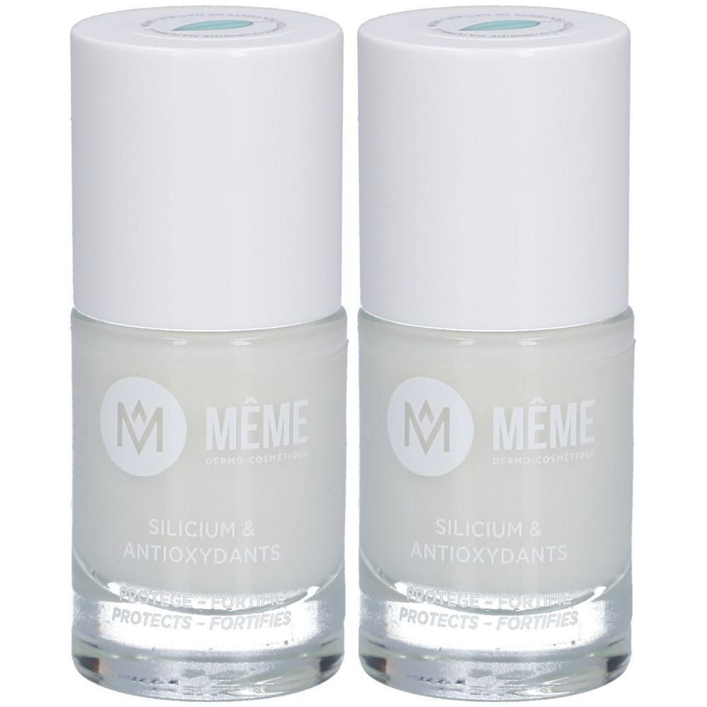 Zwei Flaschen Nagellack. Weißes Glas mit weißem Deckel. Aufschrift: MÊME, Silicium & Antioxidantien, schützt - stärkt.