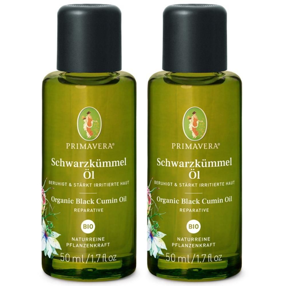 Zwei grüne Glasflaschen mit schwarzem Verschluss. Aufschrift: PRIMAVERA Schwarzkümmel Öl, BIO. 50 ml/1.7 fl oz.