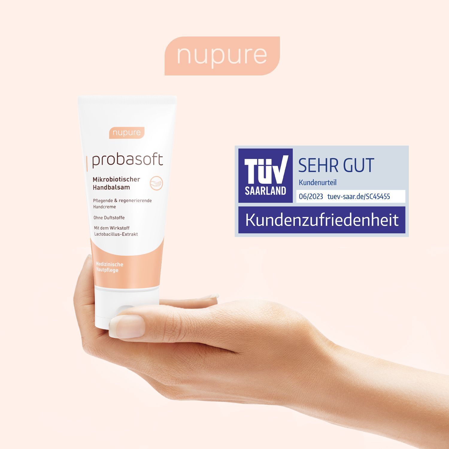 Hand hält Tube. Logo und Text: "nupure probasoft". Siegel: TÜV Saarland, Kundenzufriedenheit.