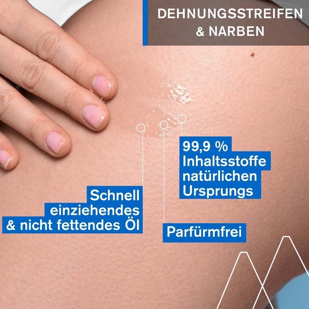Nahaufnahme einer Hautpartie mit Öl. Text: Schnell einziehendes & nicht fettendes Öl. 99,9% Inhaltsstoffe natürlichen Ursprungs. Parfümfrei.
