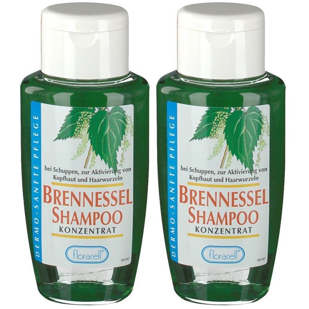 Zwei grüne Flaschen Brennessel Shampoo. Weiße Deckel, Etikett mit Produktnamen und Illustrationen. Marke: Floracell.