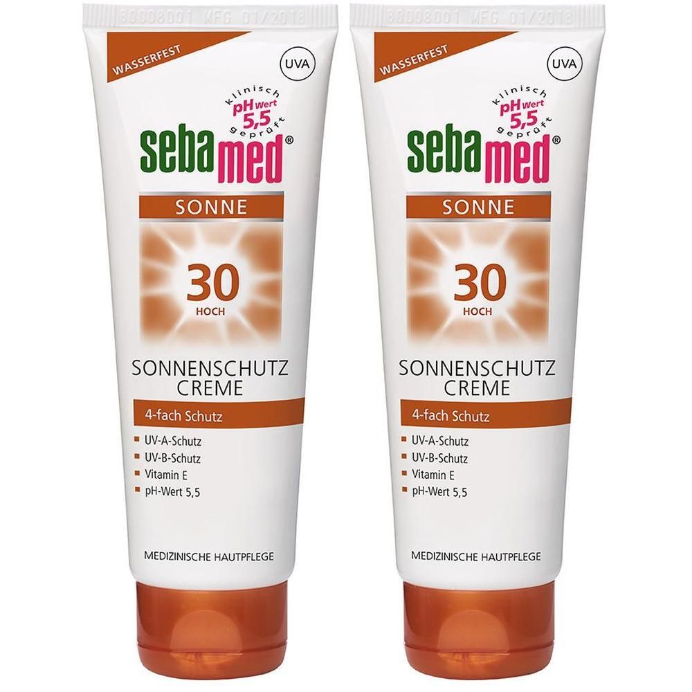 Zwei Tuben Sonnenschutzcreme. Weiß, mit braunen und grünen Akzenten. Aufschrift: sebamed® Sonne, LSF 30, Sonnenschutz Creme.