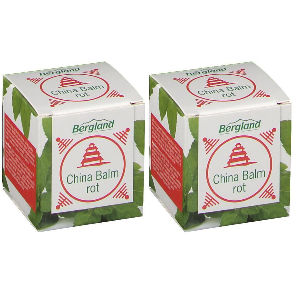 Zwei quadratische Schachteln mit "China Balm rot"-Logo. Grün-weiße Verpackung mit Blättern und rotem Text. "Bergland"-Logo oben.