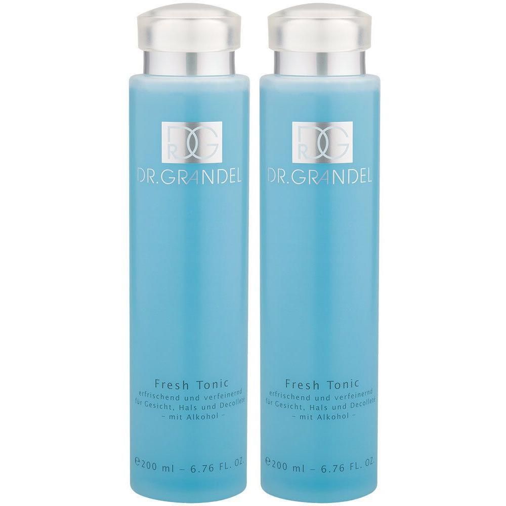 Zwei blaue Flaschen mit silbernen Deckeln. Aufschrift: DR. GRANDEL, Fresh Tonic. Text in Deutsch. 200 ml.