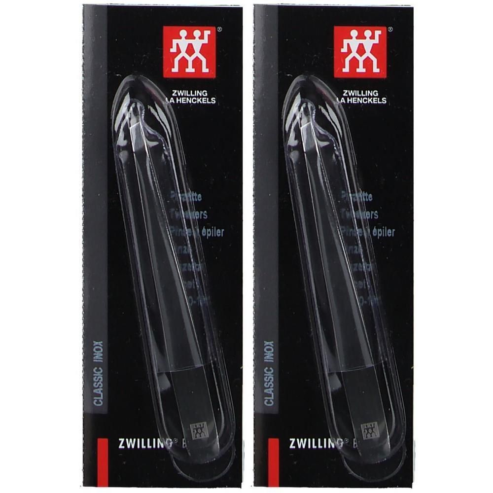 Zwei Pinzetten in schwarzer Verpackung. Marke ZWILLING. Schräge, polierte Spitze. Verpackung mit Produktnamen und Logo.