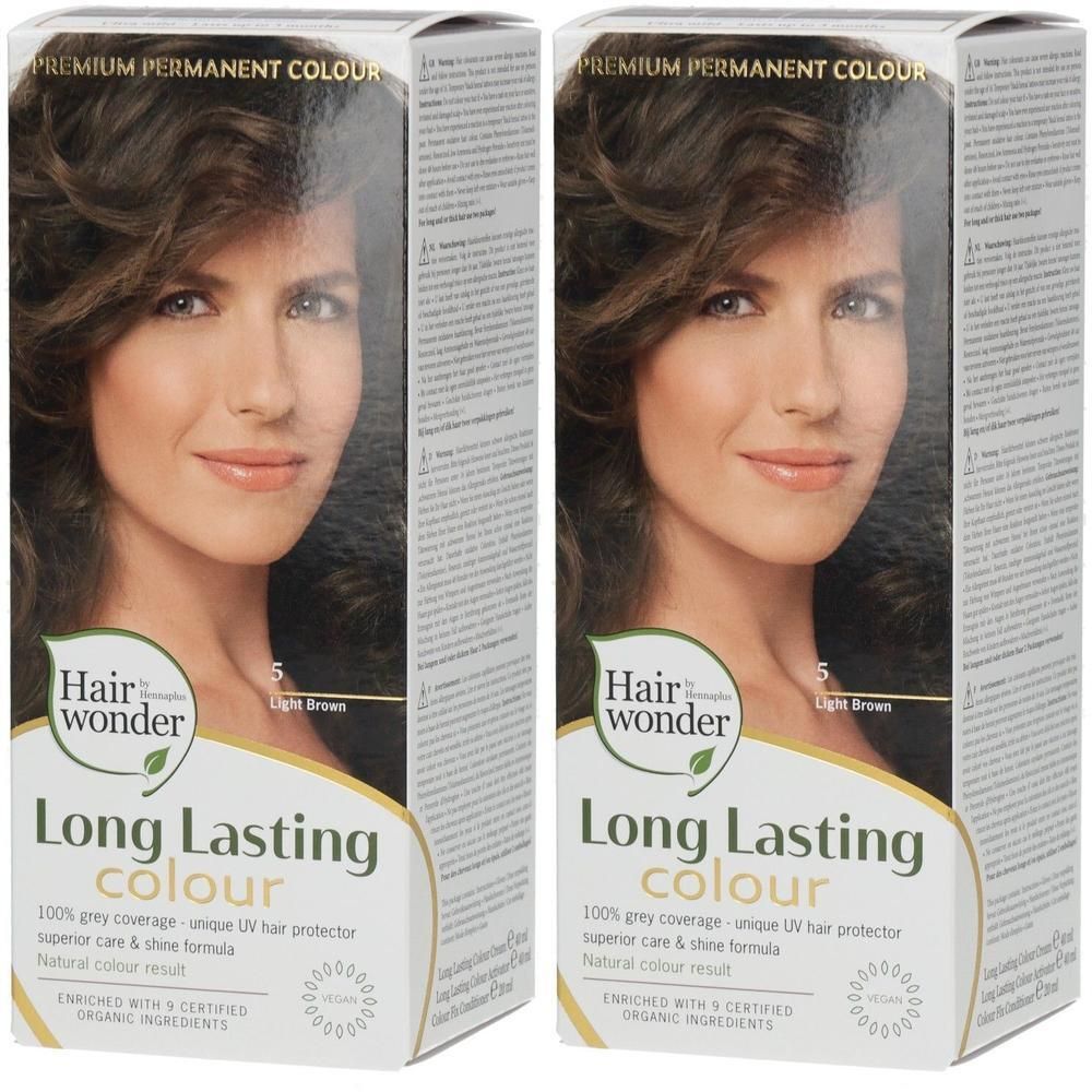 Zwei Packungen Haarfarbe. Auf der Verpackung ist eine Frau abgebildet. Text: Long Lasting Colour, 100% Grauabdeckung, UV-Schutz.