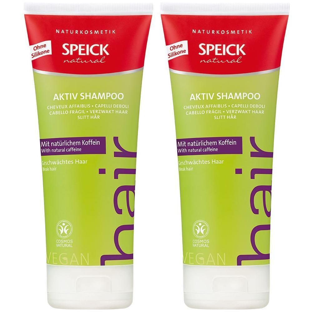 Zwei Tuben SPEICK natural Aktiv Shampoo. Rote und grüne Verpackung mit Produktinformationen und Logos. Vegan-Siegel.