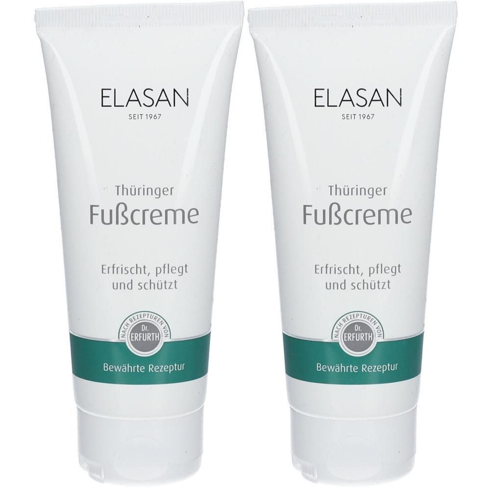 Zwei Tuben Fußcreme. Weiße Tuben mit grünen und schwarzen Schriftzügen. Aufschrift: ELASAN, Thüringer Fußcreme, erfrischt, pflegt und schützt.