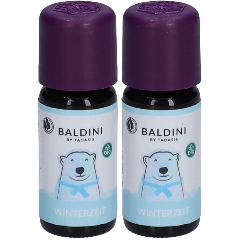 Zwei Flaschen BALDINI Winterzeit Öl. Lila Deckel, Etikett mit Eisbär. Bio-Siegel. Schriftzug Winterzeit.