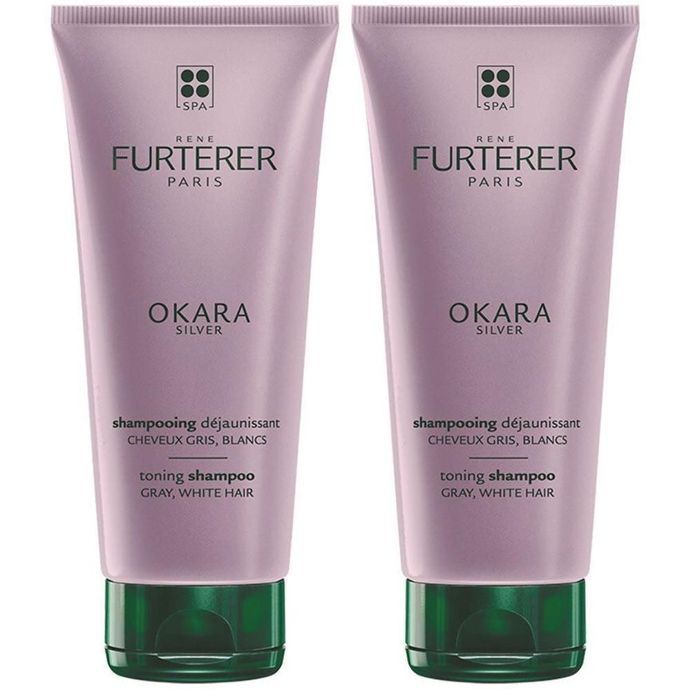 Zwei Tuben Shampoo. Auf jeder Tube steht: René Furterer Paris, Okara Silver, Shampoo für graues und weißes Haar.