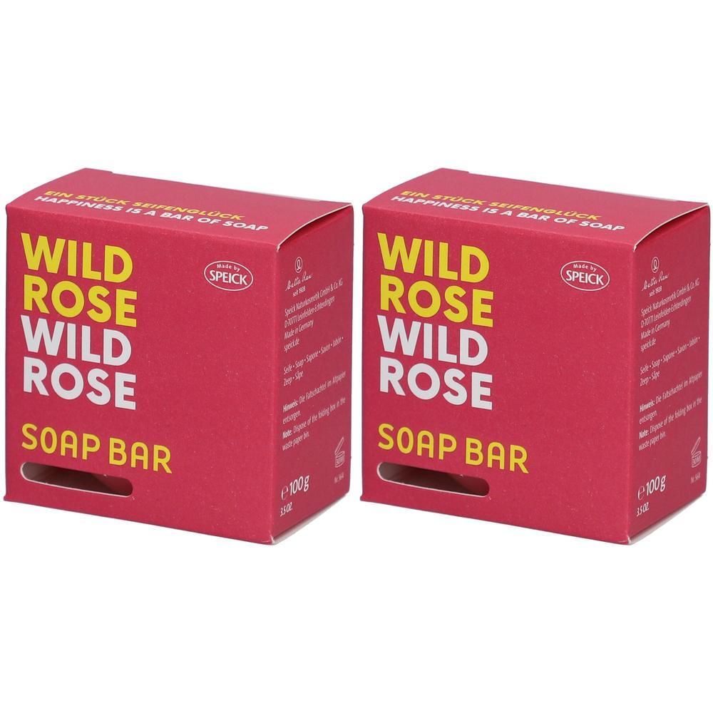 Zwei rechteckige, rote Kartons mit gelbem Text. Aufschrift: WILD ROSE SOAP BAR. Marke: SPEICK. Auf jeder Packung steht 100g.