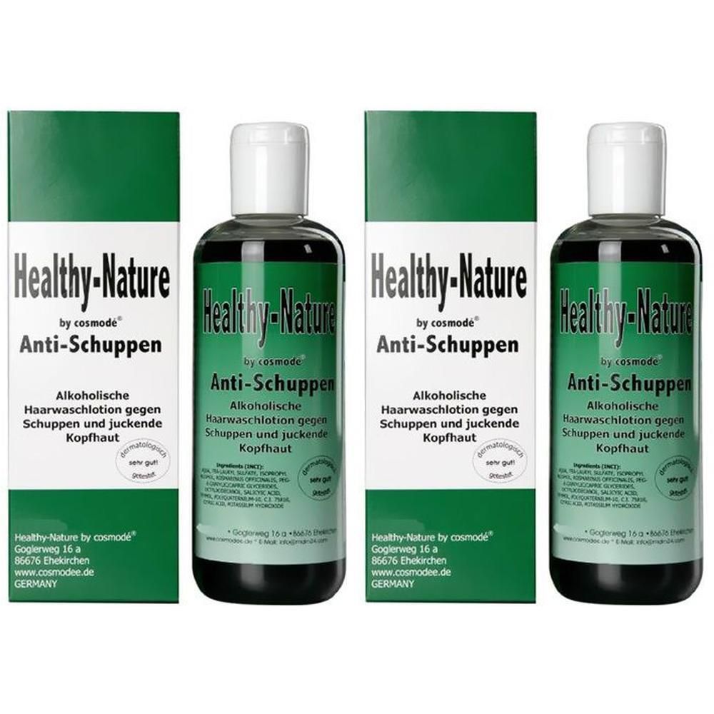Vier Flaschen Healthy-Nature Anti-Schuppen. Grüne Etiketten und Verpackung. Text: Alkoholische Haarwaschlotion gegen Schuppen und juckende Kopfhaut.