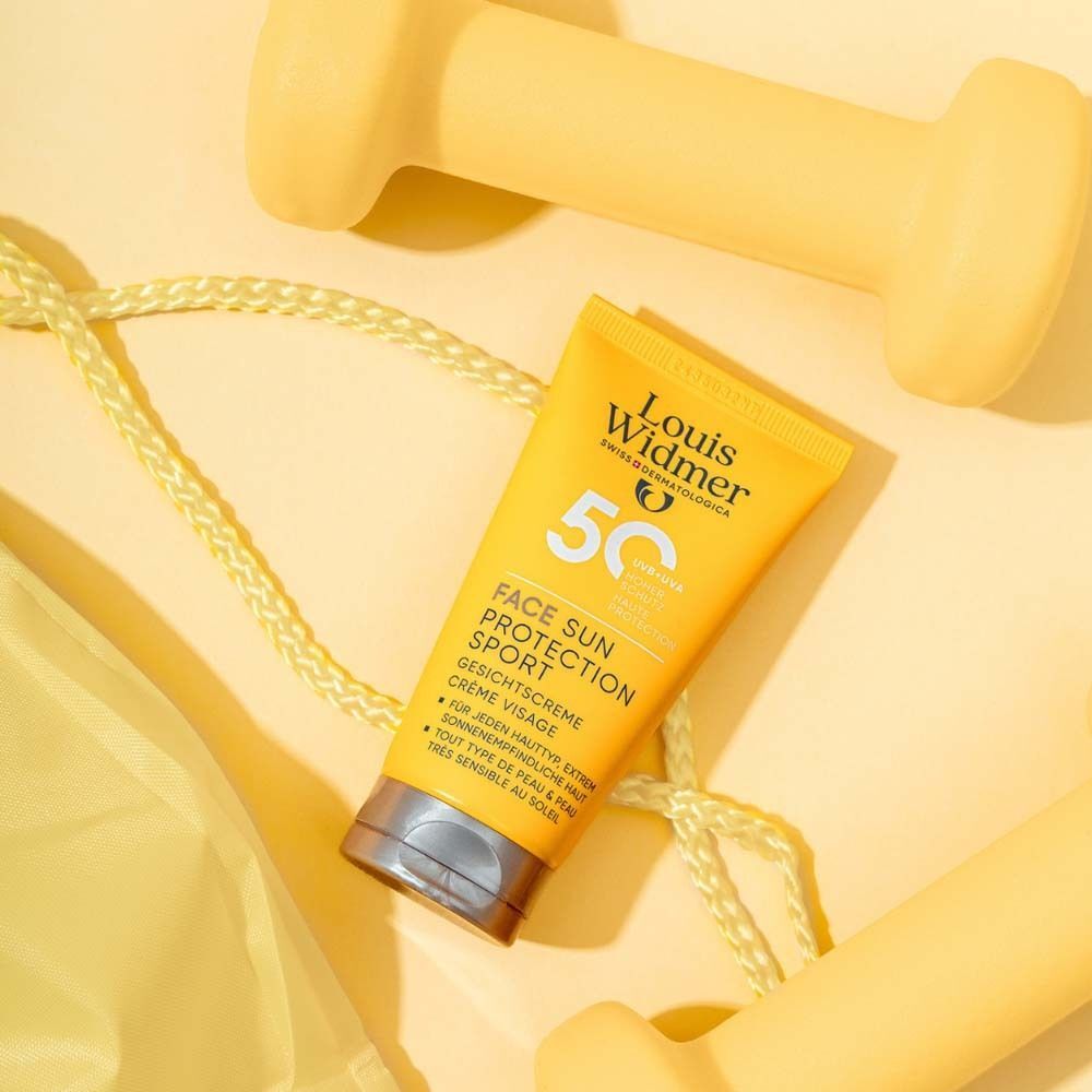 Gelbe Tube Sonnencreme. Aufschrift: Face Sun Protection Sport 50. Marke: Louis Widmer.