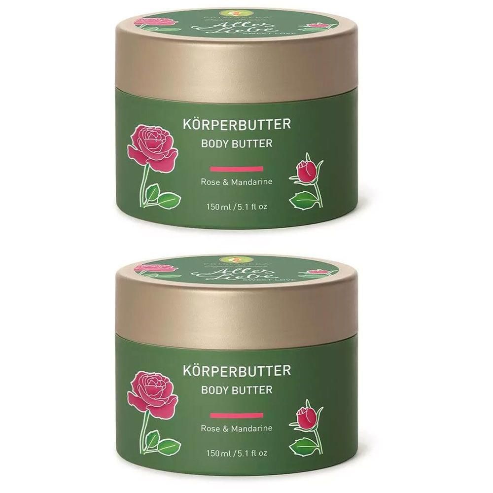 Zwei grüne Tiegel mit goldfarbenen Deckeln. Aufschrift: KÖRPERBUTTER, Rose & Mandarine. Illustrationen von Rosen. 150ml/5.1 fl oz.