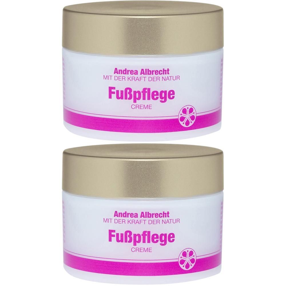 Zwei Cremetiegel mit goldenen Deckeln. Auf den weißen Etiketten steht "Andrea Albrecht Fußpflege Creme".