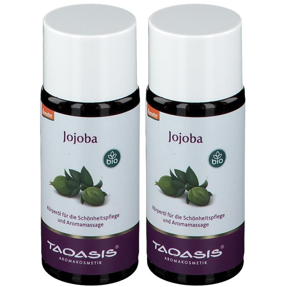 Zwei Flaschen mit weißem Deckel und schwarzem Ring. Aufschrift "Jojoba" und "bio". Darunter Abbildung von Jojoba-Früchten. Marke: TAOASIS.