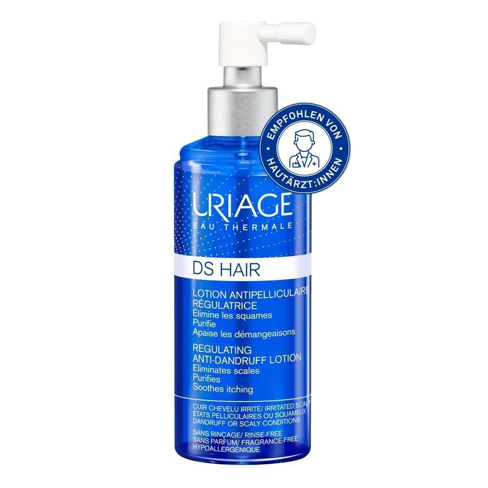 Blaue Flasche mit weißem Dosierkopf. Aufschrift: URIAGE DS HAIR. Empfohlen von Hautärzt:innen.