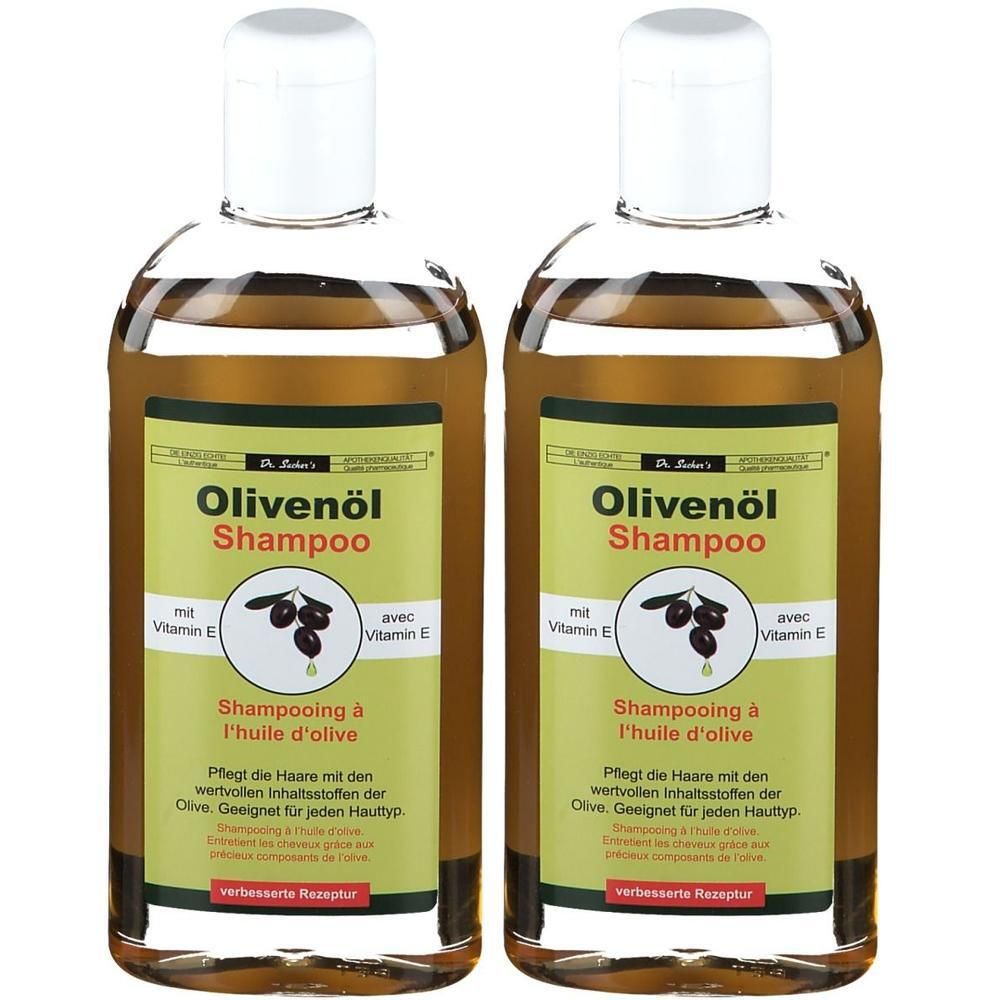 Zwei Flaschen Olivenöl Shampoo. Etikett mit Produktnamen, Oliven-Illustration und Text. Weiße Deckel, braune Flüssigkeit.