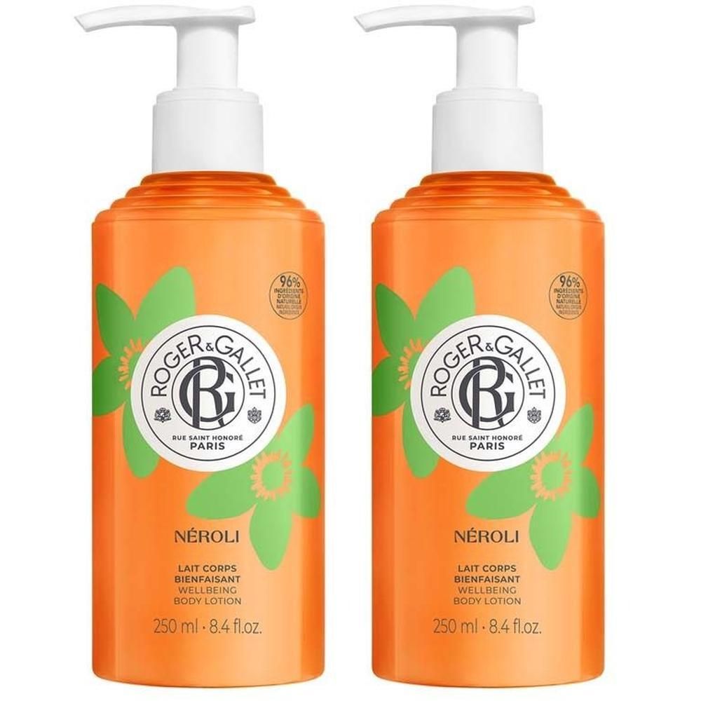 Zwei orangefarbene Körperlotion-Flaschen mit weißen Pumpen. Auf jeder Flasche: Logo, grüne Blumen, Text 'NÉROLI' und '250 ml - 8.4 fl.oz'.