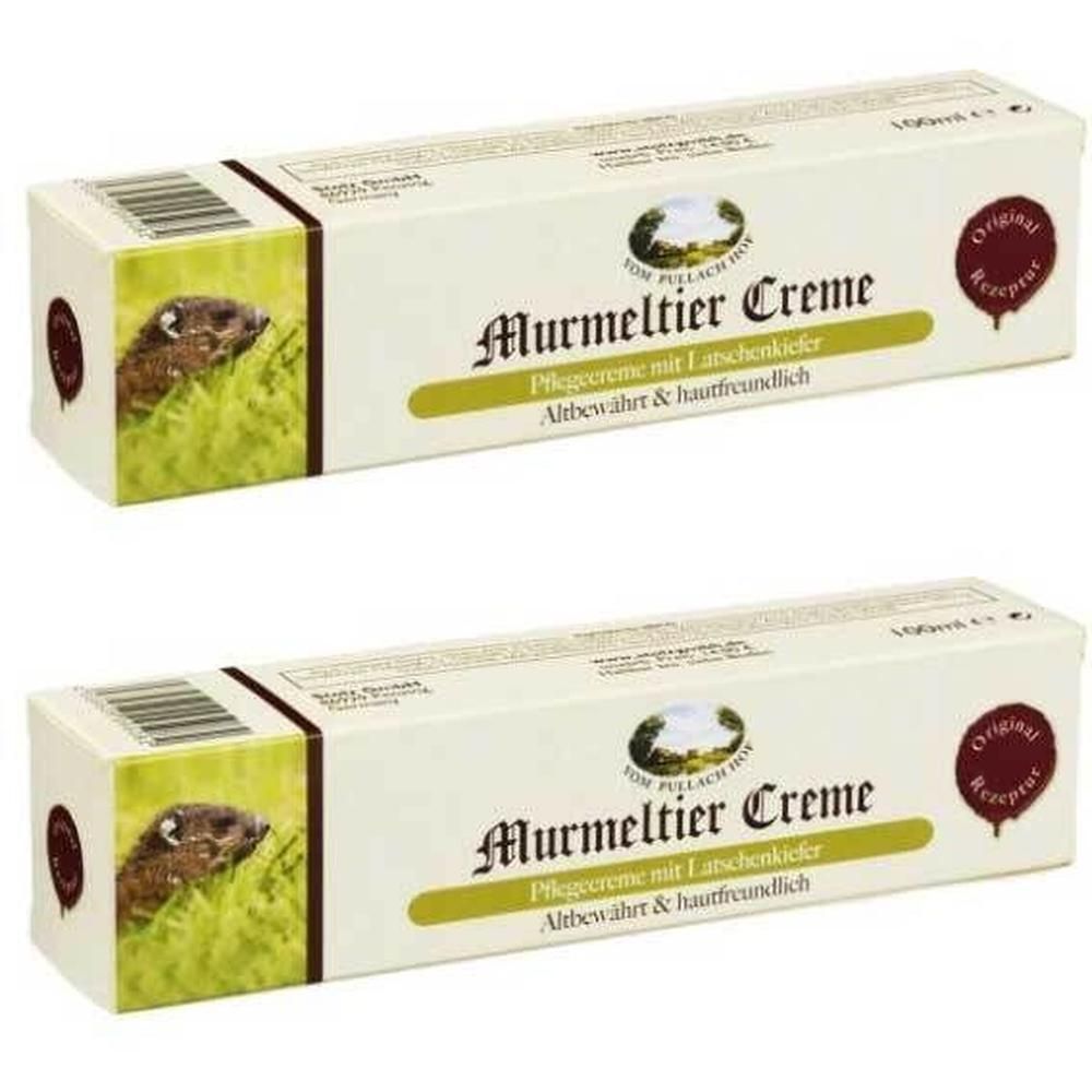 Zwei rechteckige Verpackungen. Aufschrift: Murmeltier Creme, Pflegecreme mit Latschenkiefer. Logo und roter Kreis.
