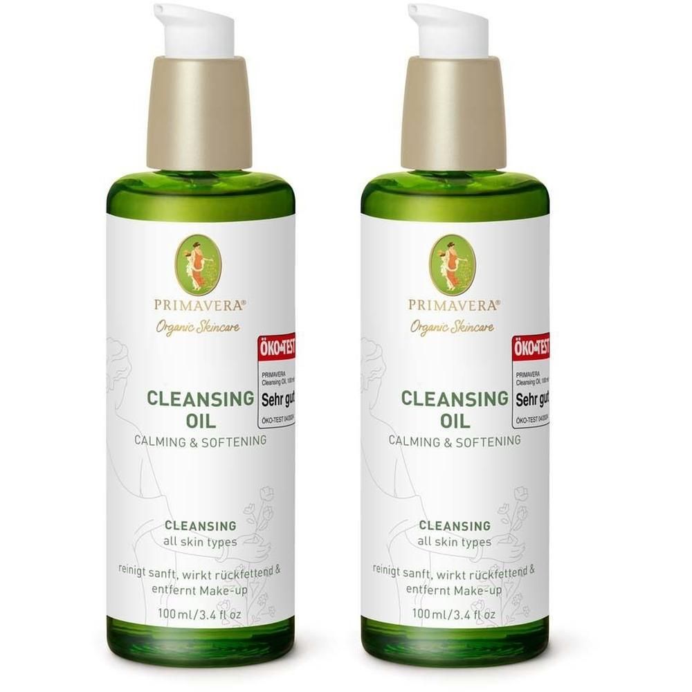 Zwei Flaschen Reinigungsöl mit Pumpverschluss. Aufschrift: Primavera, Cleansing Oil, beruhigend & weichmachend. Öko-Test Siegel.