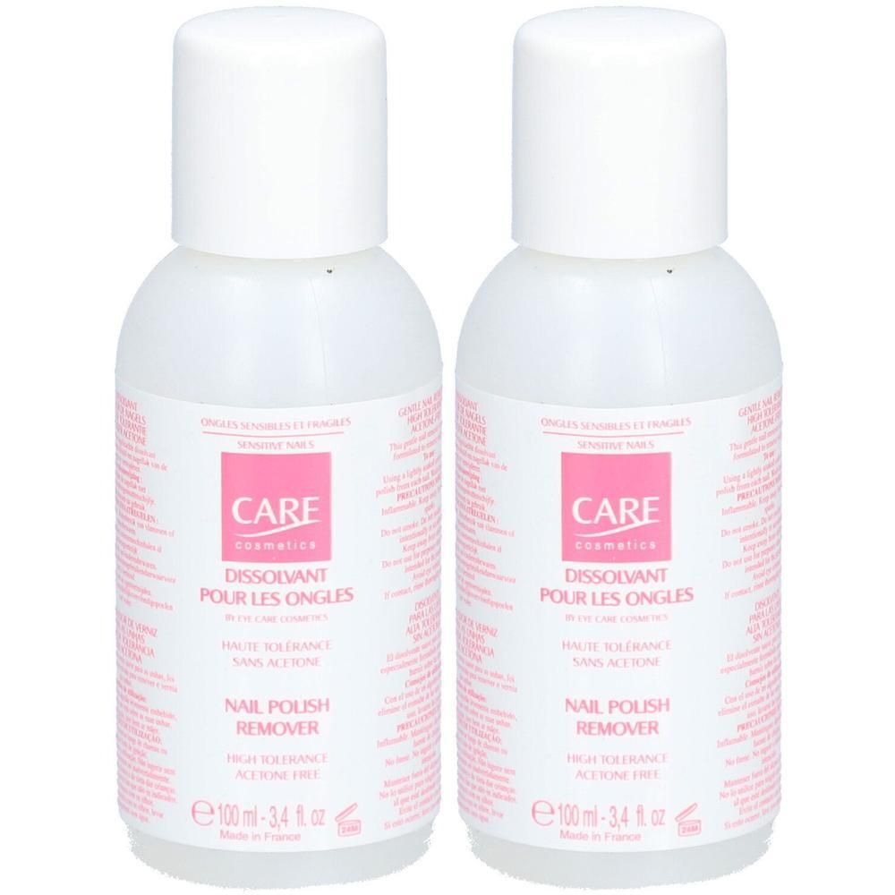 Zwei Flaschen Nagellackentferner. Weiße Flaschen mit weißem Deckel und rosa Etikett. Aufschrift: CARE, Nail Polish Remover.