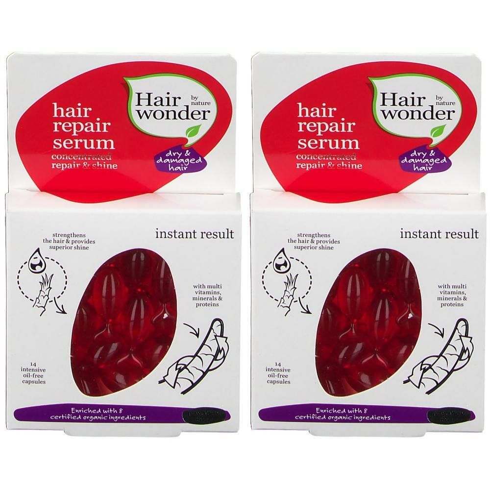 Zwei Packungen Haarserum-Kapseln. Rote Kapseln in weißen Schachteln. Aufschrift: Hair Wonder, Hair Repair Serum, Instant Result.