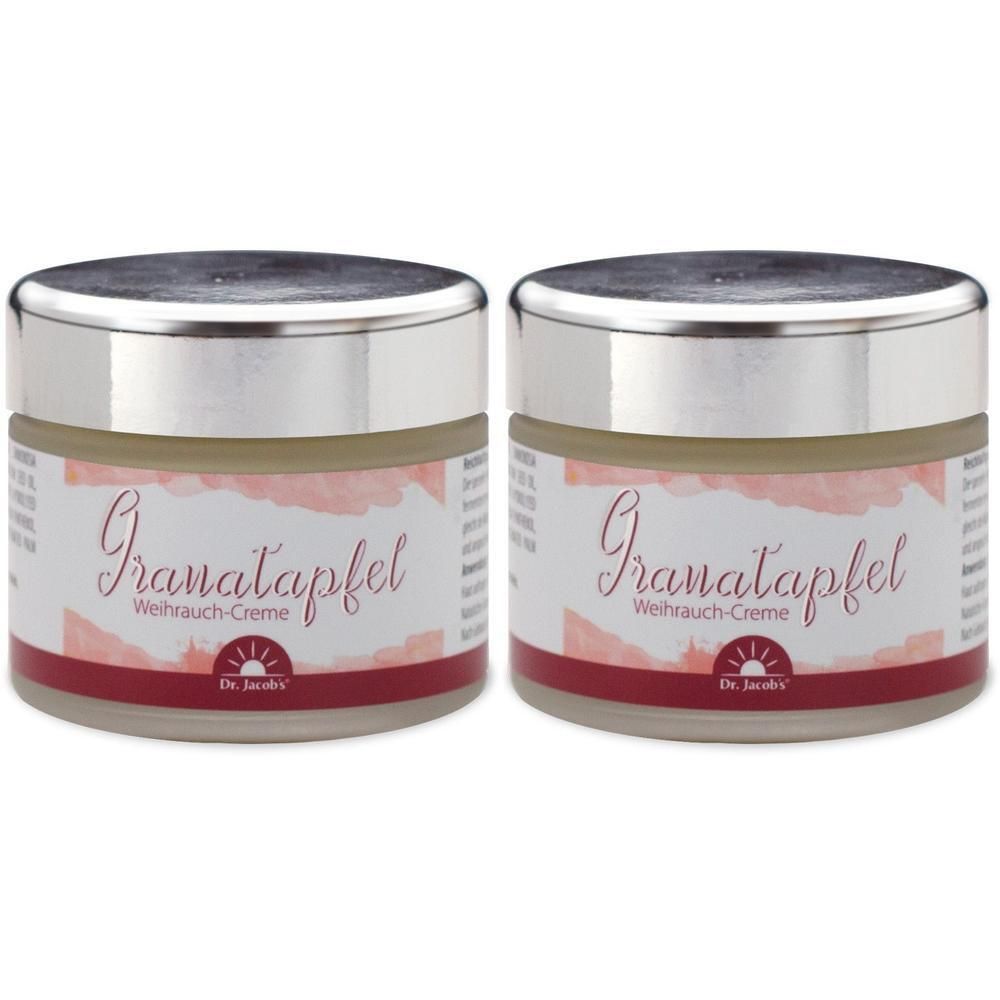 Zwei Tiegel Granatapfel-Weihrauch-Creme. Glasbehälter mit silberfarbenem Deckel und Etikett. Roter Schriftzug "Granatapfel".