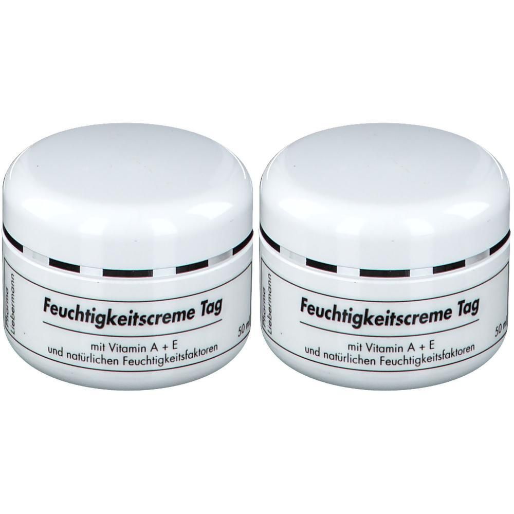 Zwei weiße Tiegel mit Deckel. Aufschrift: Feuchtigkeitscreme Tag, mit Vitamin A + E und natürlichen Feuchtigkeitsfaktoren.