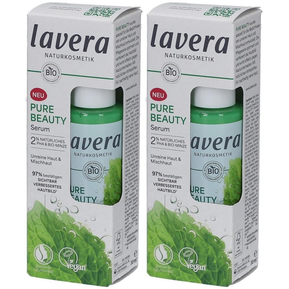 Zwei Flaschen Serum in Kartonverpackung. Aufdrucke: lavera, Pure Beauty Serum, Bio-Siegel, Vegan-Logo. Grüne Flüssigkeit sichtbar.