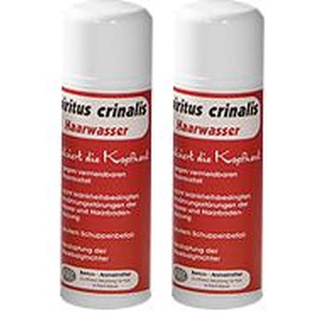 Zwei zylindrische Flaschen mit weißem Deckel und rotem Etikett. Aufschrift: Spiritus Crinalis Haarwasser.