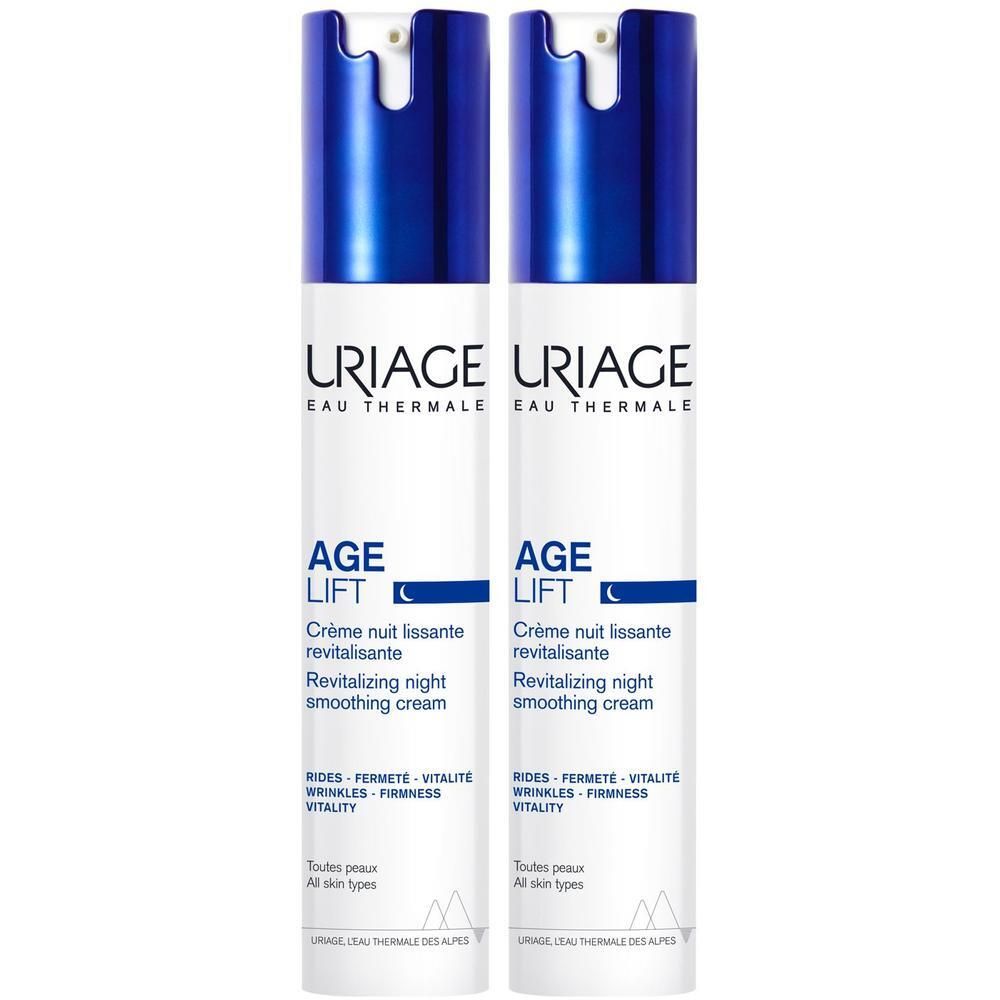 Zwei weiße Flaschen mit blauen Deckeln. Aufschrift: URIAGE AGE LIFT Crème nuit lissante revitalisante. Text: Rides-fermeté-vitalité-wrinkles-firmness-vitality.