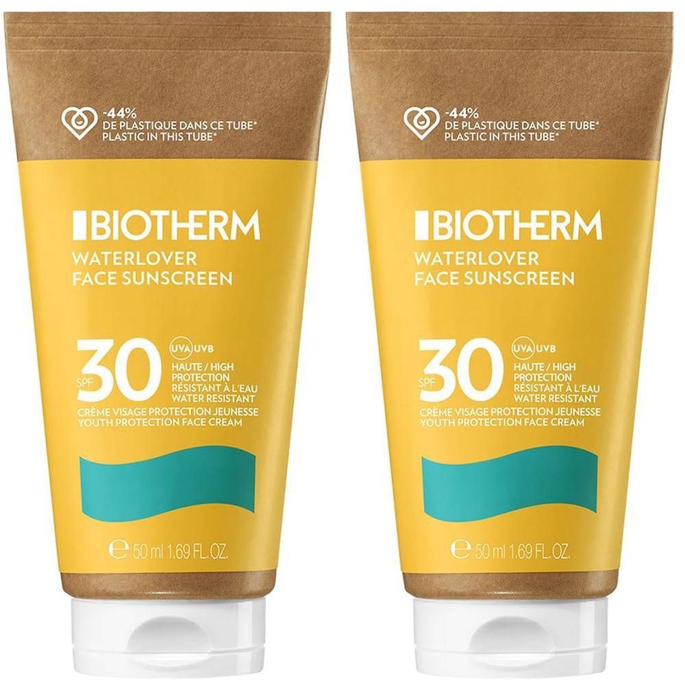 Zwei Tuben Sonnencreme. Gelbe Tube mit Aufschrift BIOTHERM Waterlover Face Sunscreen LSF 30. Mit weißem Deckel und braunem Aufsatz.