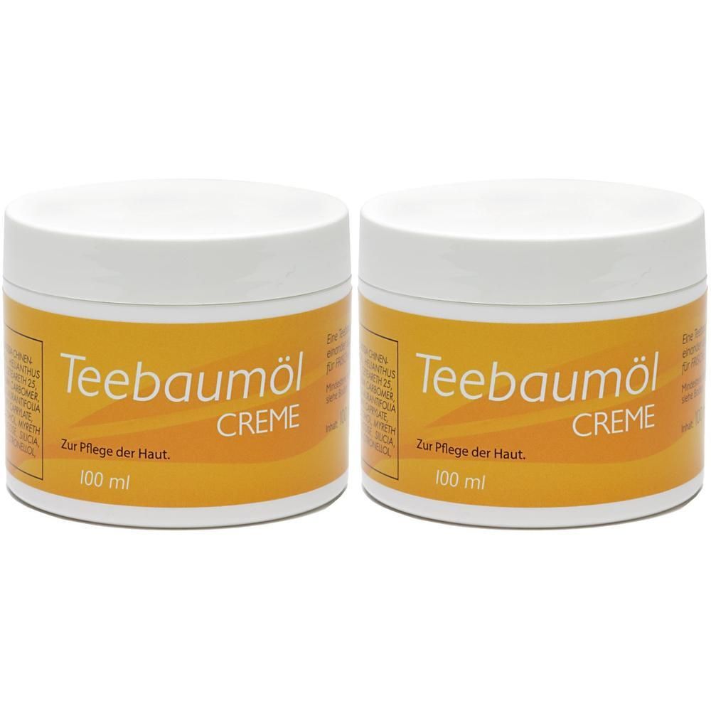 Zwei Tiegel Creme mit gelbem Etikett. Aufschrift: Teebaumöl Creme. 100 ml.