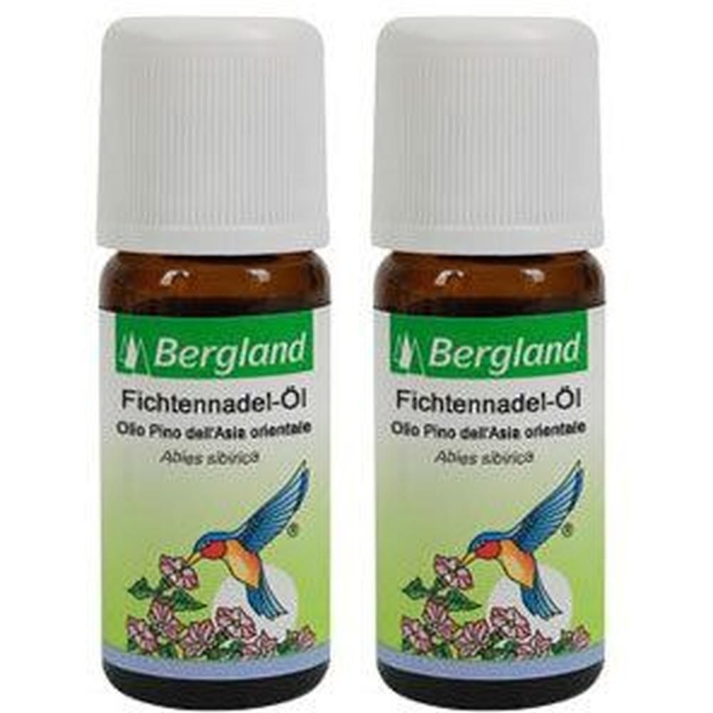Zwei Flaschen Bergland Fichtennadel-Öl. Braune Glasflaschen mit weißen Deckeln und Etiketten mit Text und Vogel-Illustration.