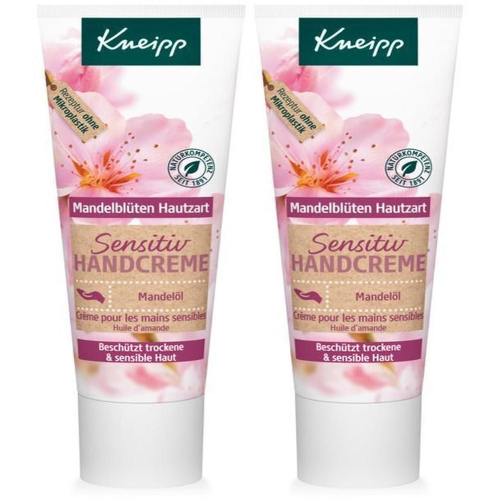 Zwei Tuben Kneipp Sensitiv Handcreme Mandelblüten. Weiße Tuben mit floralem Design und Produktinformationen.