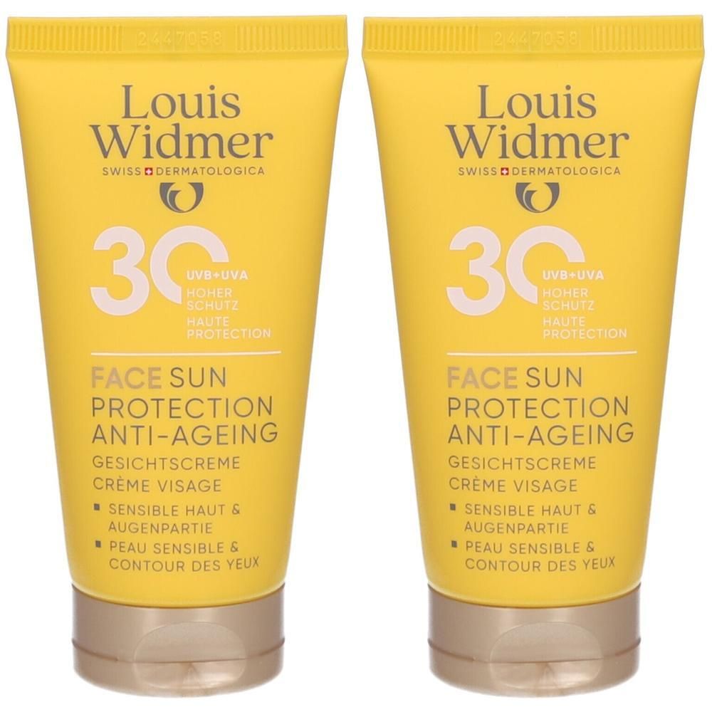Zwei gelbe Tuben Louis Widmer Face Sun Protection Anti-Ageing. Aufschrift: 30, Gesichtscreme, sensible Haut & Augenpartie.