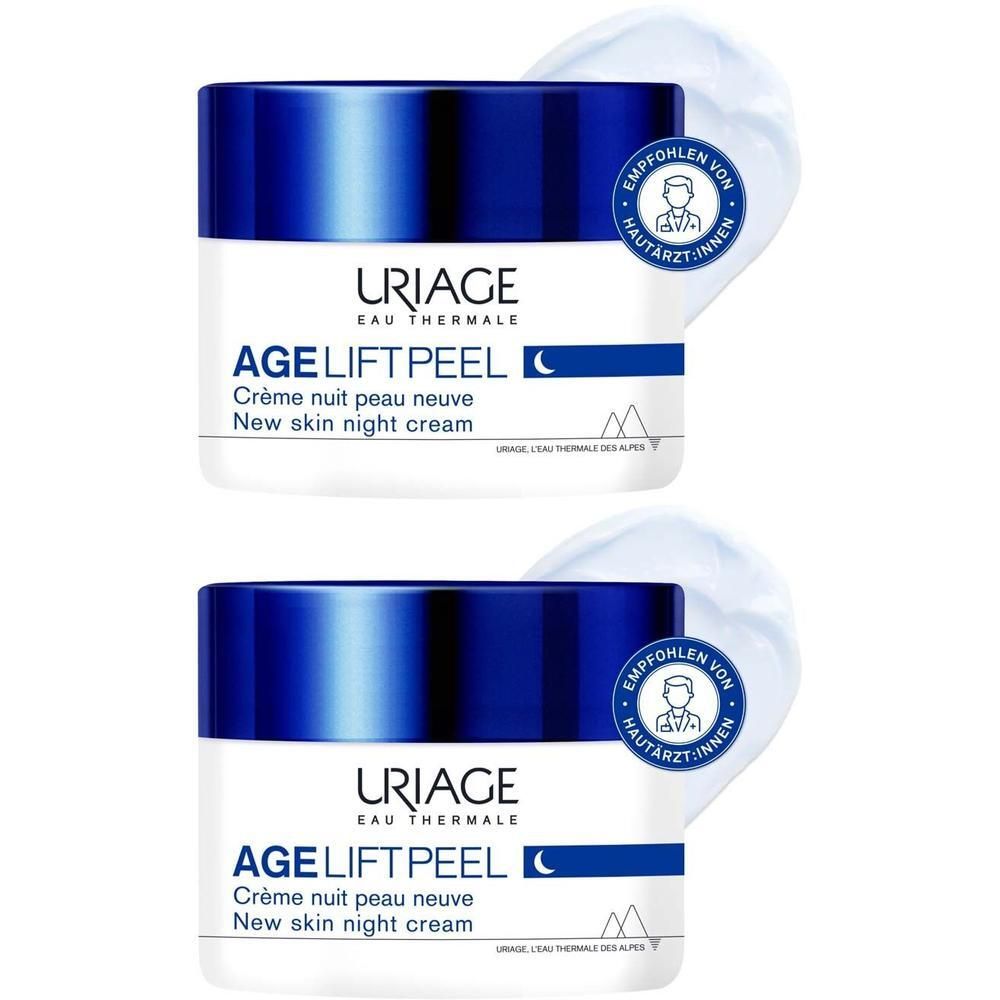 Zwei Tiegel URIAGE Age Lift Peel Nachtcreme. Weiße Tiegel mit blauem Deckel und Schriftzug. Empfohlen von Hautärzten.