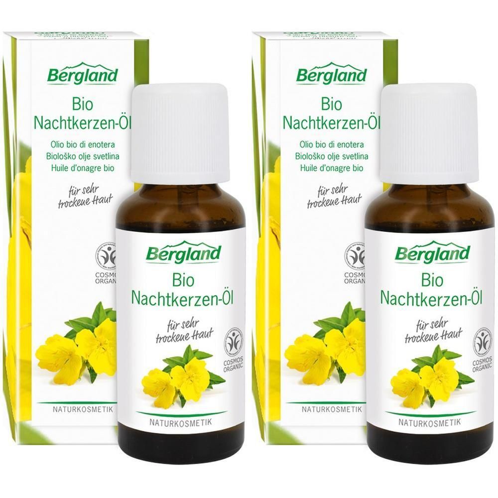 Zwei Flaschen mit braunem Glas und weißem Deckel. Aufschrift: Bergland Bio Nachtkerzen-Öl. Verpackung mit gelben Blüten.