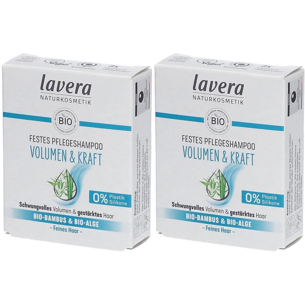 Zwei weiße Kartons mit Produktinformationen. Aufschrift: lavera, BIO, Festes Pflegeshampoo Volumen & Kraft. Enthält Bambus & Algen. 0% Silikone.