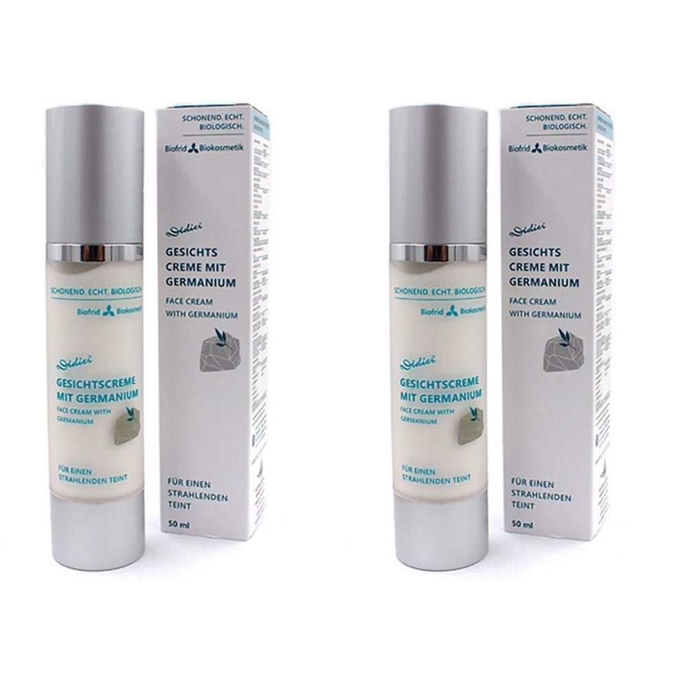Zwei Flaschen Didier® Hautcreme mit Germanium und Verpackungen. Aufschrift: Gesichtscreme mit Germanium. Flaschen mit silbernem Deckel.