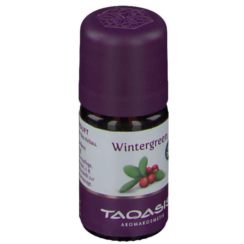 Braune Glasflasche TAOASIS® Wintergreen BIO mit lila Deckel. Etikett mit Wintergreen-Schriftzug, Blättern und Beeren.