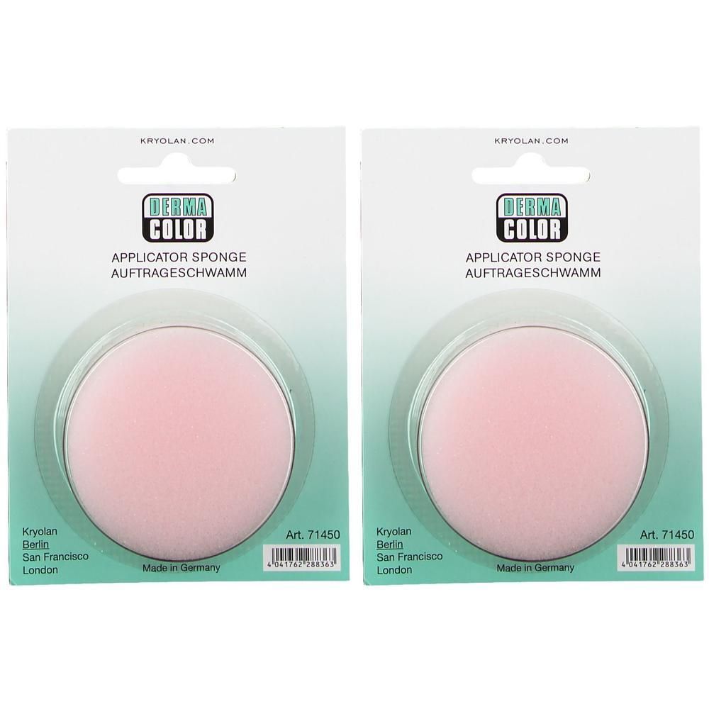 Zwei runde, rosa Auftrageschwämme in Verpackung. Aufschrift: DERMA COLOR, APPLICATOR SPONGE, AUFTRAGESCHWAMM.