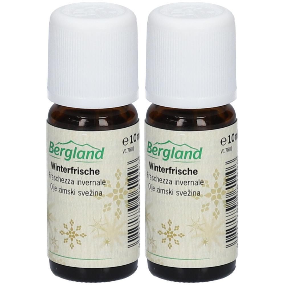 Zwei kleine braune Glasflaschen mit weißem Schraubverschluss, Bergland Winterfrische Öl, 10ml.