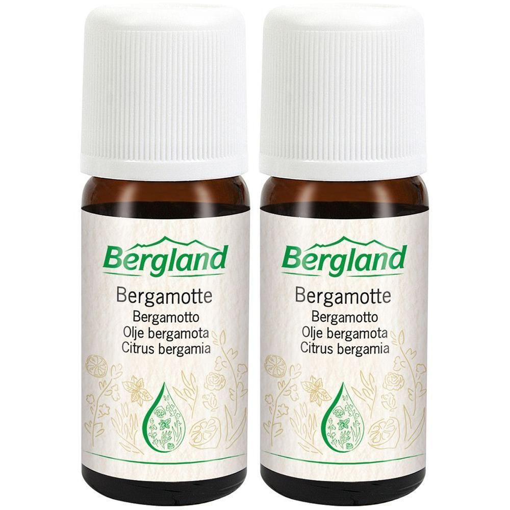 Zwei braune Glasflaschen mit weißen Deckeln. Auf den Etiketten steht "Bergland Bergamotte".