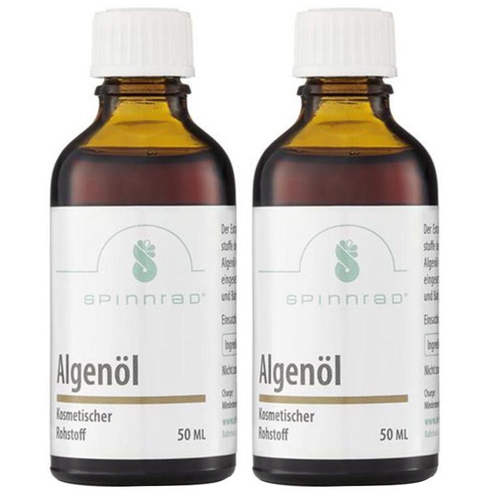 Zwei braune Glasflaschen mit weißem Deckel. Auf dem Etikett steht "Algenöl" und "50 ML". Marke: Spinnrad.