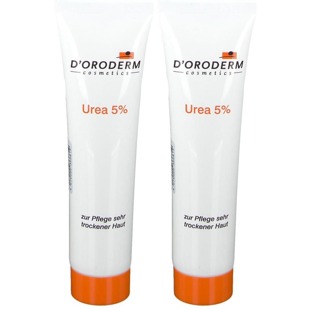 Zwei Tuben DORODERM Urea 5% Creme. Weiße Tuben mit orangefarbenem Boden. Aufschrift: "zur Pflege sehr trockener Haut".