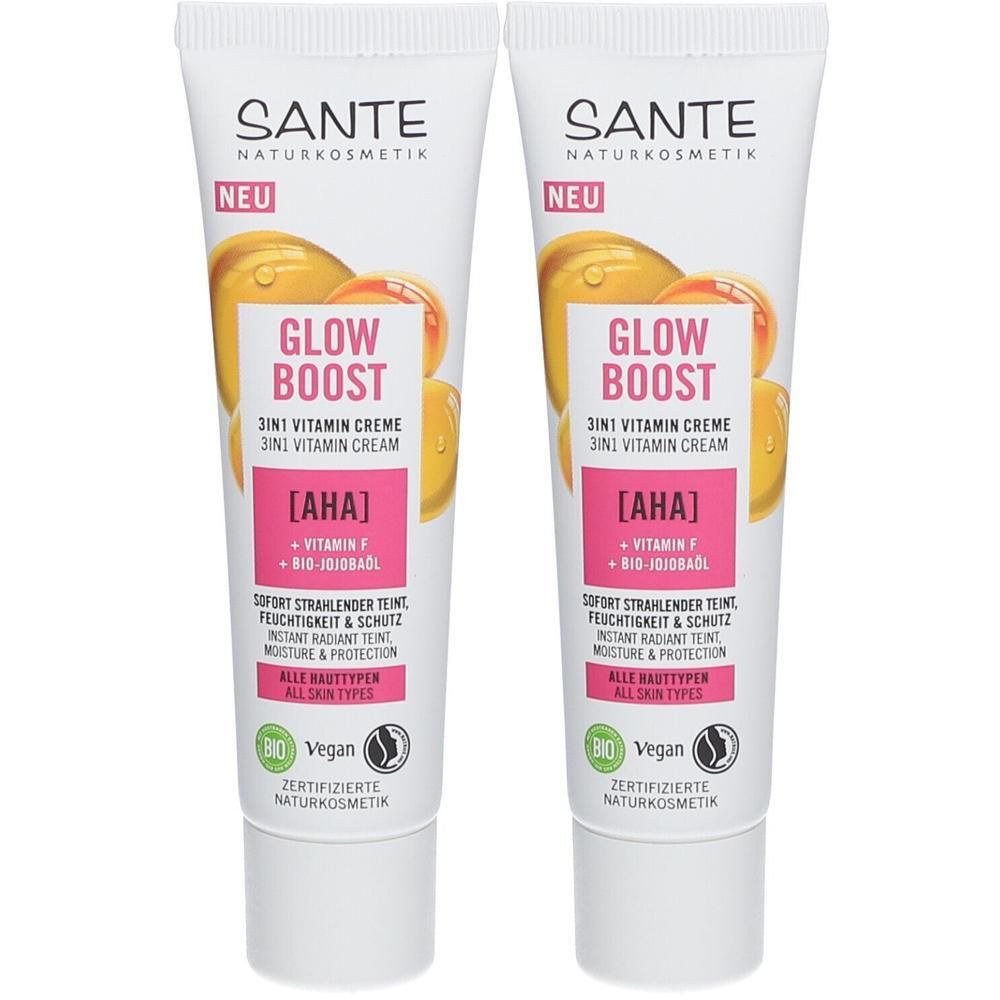 Zwei Tuben SANTE GLOW BOOST Vitamin Creme. Weiße Tuben mit Produktnamen und Inhaltsangaben. Bio-Vegan-Siegel.
