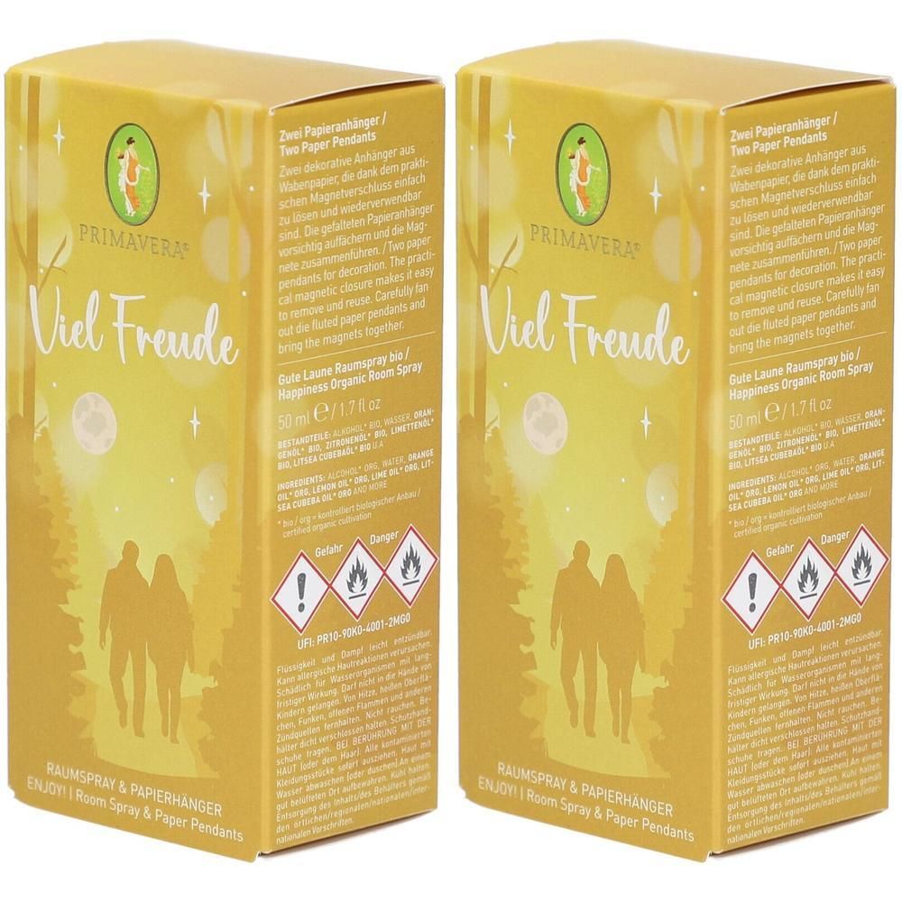 Zwei gelbe Kartons mit dem Aufdruck "Viel Freude" und PRIMAVERA-Logo. Sie enthalten Raumspray und Papieranhänger. Warnhinweise sind sichtbar.