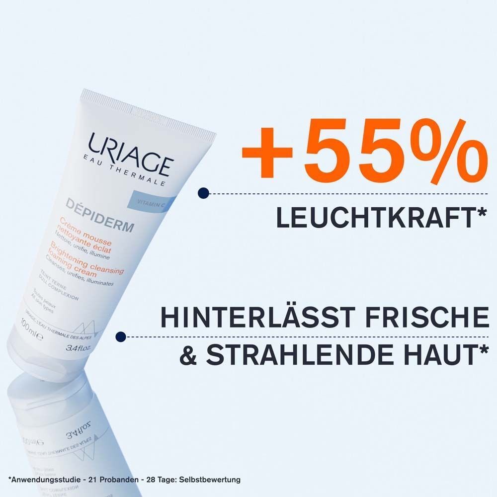 Uriage Dépiderm Reinigungsschaum-Tube. Text: '+55% Leuchtkraft'. Hinterlässt frische & strahlende Haut.